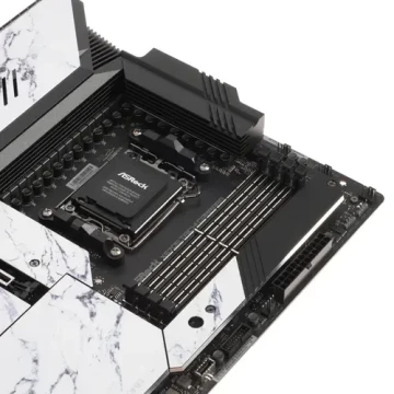 ΠΠ°ΡΠ΅ΡΠΈΠ½ΡΠΊΠ°Ρ ΠΏΠ»Π°ΡΠ° ASRock X670E TAICHI CARRARA